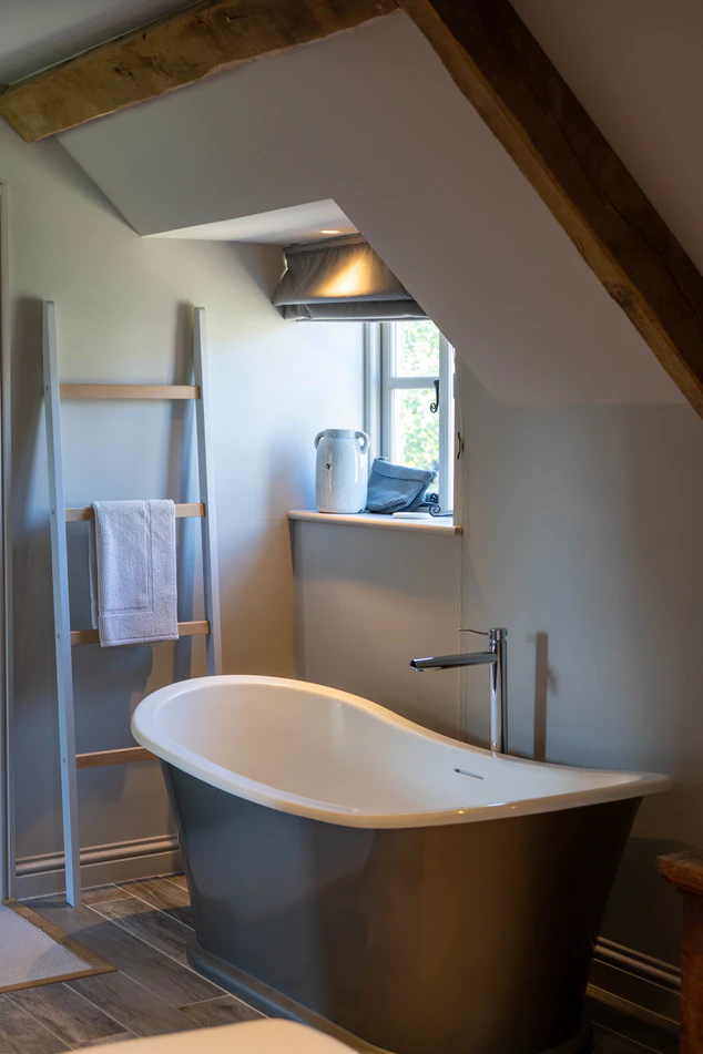 Complete bathroom transformation with new tile surround
